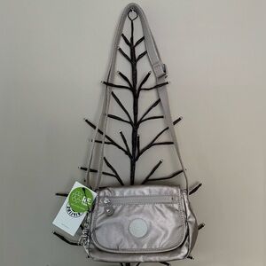 - Brand new “Kipling “crossbody mini bag for women.Size-w10”x6”inc.Metallic glow
